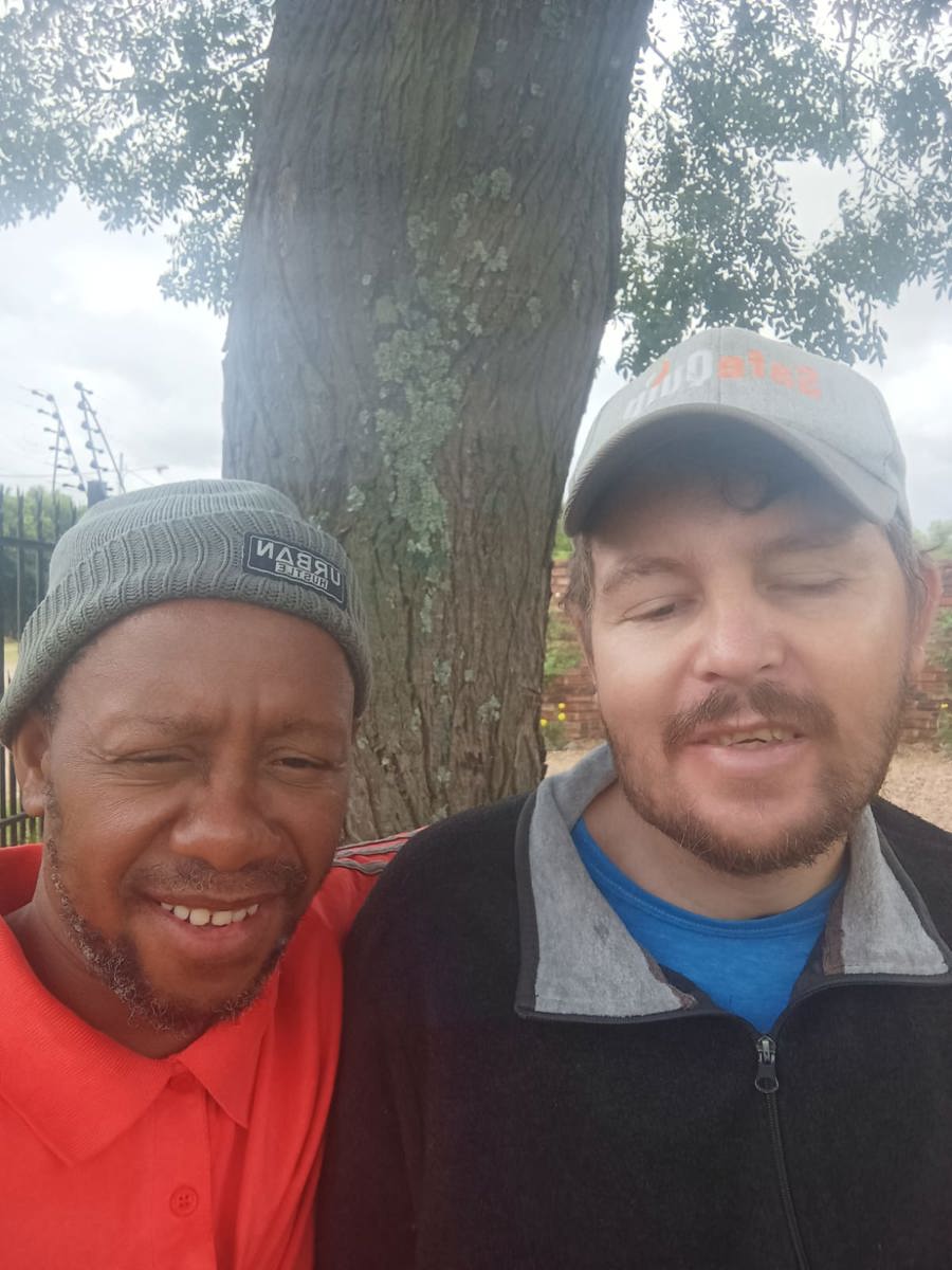 JW Stemmet and Klaas Mosala Mofoyosi together, reflecting a friendship shaped by years of daily care.