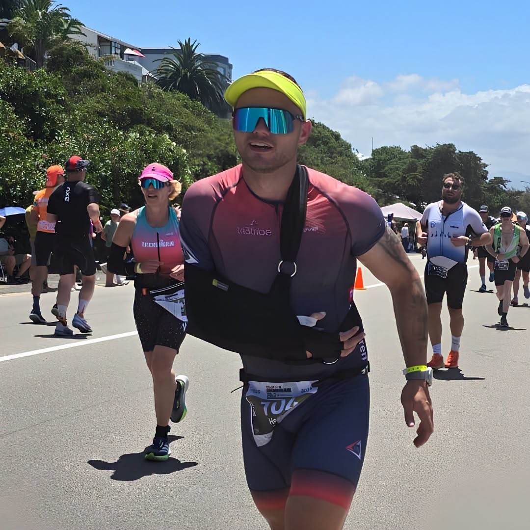 Henno Hendrikse competing in an endurance event during his Ironman journey